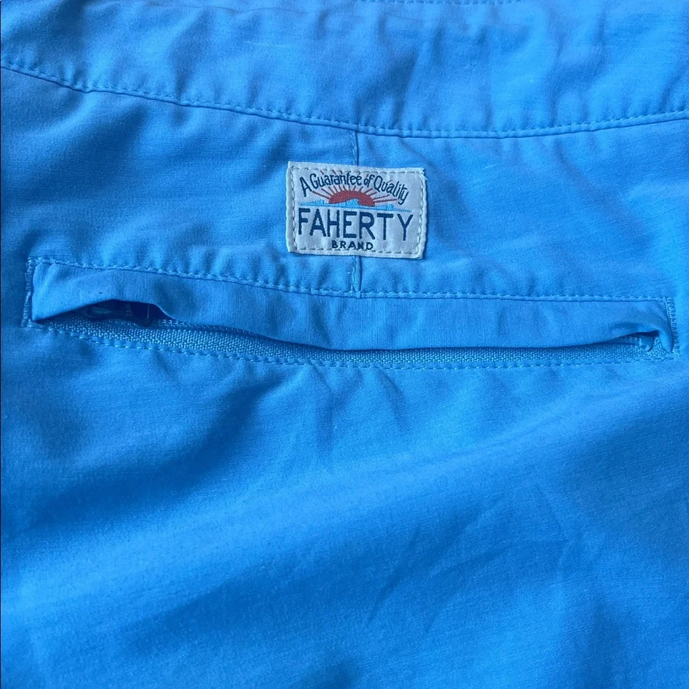 Faherty All Day Shorts, light blue size 33, button, zipper and drawstring.